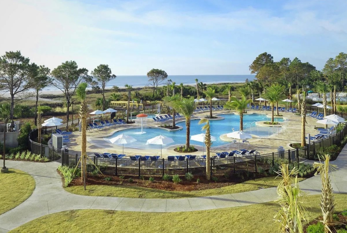 resort exterior with pool view