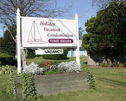 Holiday Vacation Condominiums sign