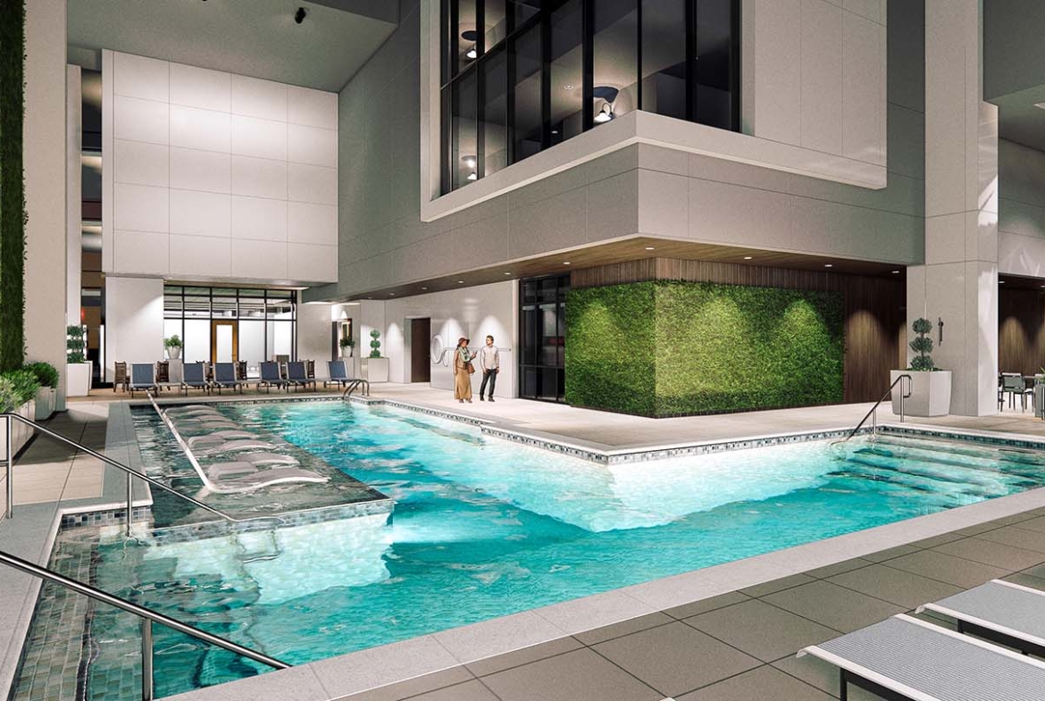 A modern pool area with a city view at Club Wyndham Atlanta.